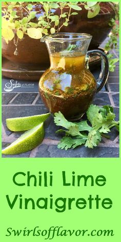 chili lime vinaigrete in a glass pitcher next to an avocado