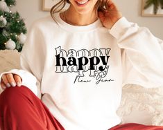 "New Years Eve Sweatshirt, Hello 2023 Happy New Years Shirt, Happy New Year Festive Party Shirts For Women, Cute Crewneck Matching This shirt has a hand pressed design. It has a very soft touch that you will feel comfortable for a long day. HOW TO ORDER ** Check and Review all Photos. ** Select your item's Size and Color from drop down menus. ** Choose the Quantity you want. ** Provide personalization in personalization box if offered.(name, print color etc.) ** Click ADD TO CART. And, you can go back to add more product color for your family members or you can complete the checkout process. ** Please Click \"Proceed to Check Out\" ** Finally, Your order will be ready to ship 1 - 3 Business Day. Due to the nature of the fabric as well as your monitor or mobile screen colors may differ slig Happy New Year Shirt Ideas, Happy New Year Tshirt Ideas, Party Shirts For Women, Nye 2024, Hello 2023, Happy New Year Shirt, Cute Crewneck, Heat Press Printing, Happy New Years