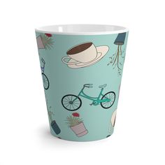 a paper cup with an image of bicycles and plants on the front, in blue