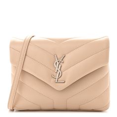 This is an authentic SAINT LAURENT Calfskin Y Quilted Monogram Toy Loulou Crossbody Bag in Nude Powder. This elegant shoulder bag is crafted of chic chevron quilted calfskin leather in beige. The front flap has a removable leather shoulder strap, prominent aged gold YSL monogram detail and opens to a partitioned black fabric interior with a zipper pocket and card slots. Quilted Toys, Hazel Green, Chevron Quilt, Bag Light, Saint Laurent Bag, Wallet Chain, Black Cross Body Bag, Gucci Dionysus, Black Fabric