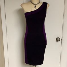 Bebe One Arm Stretch Body On Dress! Super Stretchy And Flattering On Most Body Types! Black And Deep Purple Down The Front And Purple With Some Black Down The Sides. Never Worn! Nwot Elegant Purple Stretch Bodycon Dress, Purple One Shoulder Mini Dress For Night Out, Purple Stretch Bodycon Dress For Formal Occasions, Elegant Purple Bodycon Dress For Night Out, Elegant Purple Sleeveless Bodycon Dress, Elegant Sleeveless Purple Bodycon Dress, Elegant Stretch Purple Mini Dress, Purple Fitted One-shoulder Mini Dress, Elegant Purple Stretch Mini Dress