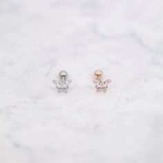 ⇢⇢ PLEASE READ BEFORE PURCHASING ⇠⇠ ✧✧ This listing is for ONE piece only ✧✧ PLEASE BE AWARE of your own ear piercing size!! Everyone has different sizes and shaped ears, with different gauge sizes, so our suggestion may NOT be for everyone. 💜 Item Details 💜 ✧ Thickness: 16 Gauge (1.2mm) ✧ Top Size: 7mm x 6mm ✧ Externally Threaded ✧ For: Cartilage, Tragus, Helix, Conch ✧ Colors: Rose Gold / Silver ✧ Ball Back (4mm) ✧ 1 Piece ✧ If you wanted a 3mm ball end (Silver color only), please leave me a Rose Gold Drop Cartilage Earrings Single Earring, Rose Gold Drop Cartilage Earring, Rose Gold Pierced Ear Cuff As Gift, Dainty Rose Gold Single Cartilage Earring, Delicate Rose Gold Single Cartilage Earring, Drop Earrings Piercings For Gift, Rose Gold Single Cartilage Earring For Wedding, Rose Gold Single Earring Ear Cuff As Gift, Rose Gold Single Ear Cuff As Gift