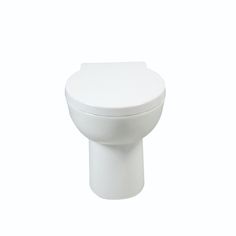 a white toilet sitting on top of a white floor