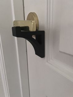 an open door with a black handle on it