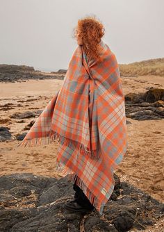 Experience ultimate comfort with our pure wool blanket. Perfect for those chilly evenings or adding a warm touch to your home, this blanket combines softness and durability. Enjoy the natural breathability and timeless charm of wool, making every moment of relaxation wonderfully cosy. Click the pin now! Photo Courtesy of Scottish Textiles Showcase. Wool Vest, Blanket Wrap