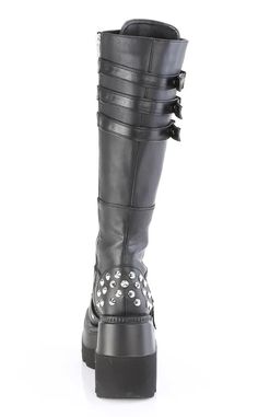 STOMP ON IN! The Demonia SHAKER-225 knee-high boots are the punkest platform boots around with a wedge platform that's just the perfect height to wear every day! They feature stud details, a buckle strap on the toe, and a buckle on shield in front with lots of kickass spikes! Plus side zip for easy on and off. Vegan Black patent leather 4 1/2 inch wedge Knee High Side zip U.S women's sizing-refer to size chart for more info Alternative Style Knee-high Leather Platform Boots, Alternative Style Leather Knee-high Platform Boots, Alternative Knee-high Leather Platform Boots, Punk Style Knee-high Platform Moto Boots, Gothic Leather Platform Boots With Grommets, Punk Leather Knee-high Boots For Concert, Leather Platform Boots With Buckle For Alternative Fashion, Studded Leather Platform Boots In Alternative Style, Studded Leather Platform Boots For Concerts