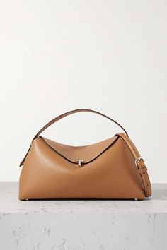 Shop TOTEME T-Lock textured-leather shoulder bag, Explore the latest TOTEME women's collection today on NET A PORTER Boot Pumps, Clothes Collection, Net A Porter, Body Bag, Fashion Bracelets, Fashion Watches, Evening Bags, Fashion Earrings, Mini Bag