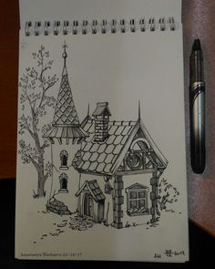 a drawing of a house with a clock tower on it's roof and a pen next to it