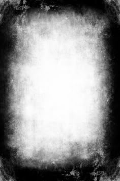 an old black and white photo with some light on the edges in the center, as well as dark grungy paint