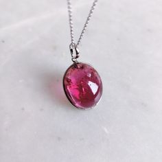 This stunning pendant is set in 14K Solid White Gold with Natural Rubellite Pink Tourmaline with utmost precision. It is an unique gemstone pendant for nearly every occasion and is completely hassle-free jewelry. 🔷 ABOUT GEMSTONE: Pink Tourmaline is a stunning gemstone, cherished for its soft pink hues that embody love, compassion, and emotional healing. Known as a stone of the heart, Pink Tourmaline is believed to promote feelings of joy, acceptance, and emotional balance, making it an excelle Oval Cabochon Tourmaline Jewelry, Oval Tourmaline Gemstones As Gifts, Oval Tourmaline Necklace Fine Jewelry, Oval Tourmaline Necklace In Fine Jewelry Style, Tourmaline Gemstone Oval Pendant Jewelry, Oval Tourmaline Birthstone Jewelry, Fine Jewelry Tourmaline Gemstones As Gift, Fine Jewelry Tourmaline Gemstones For Gift, Tourmaline Gemstones For Gifts, Fine Jewelry Style