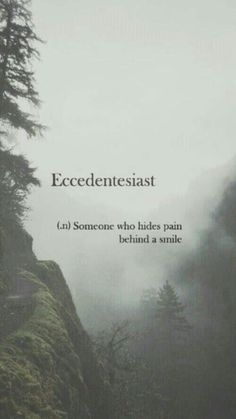 an image of a foggy mountain with trees on the side and text that reads, ecededentesiast