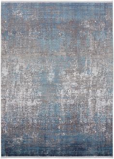 an area rug with blue and grey colors on the bottom, red trim around the edges