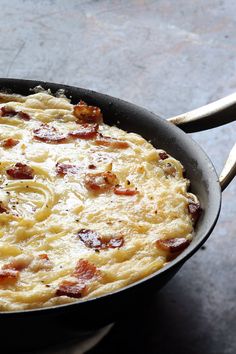 a skillet with some food inside of it