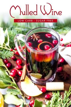 mulled wine with cranberries and apples in a glass mug