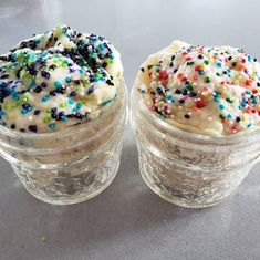 two desserts with sprinkles in small glass containers