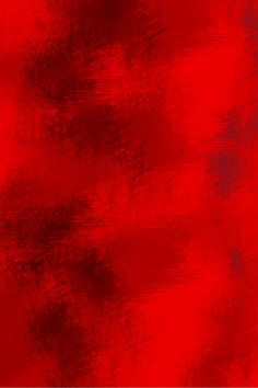 an abstract red and black background with some stains on the bottom half of the image