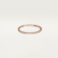 Cartier - Étincelle de Cartier wedding band - Ring Woman Pink gold/Diamond - Étincelle de Cartier wedding band, 18K rose gold (750/1000), set with 49 brilliant-cut diamonds totaling 0.22 carats. 1.52 mm wide (for size 52). Also available as a midi ring. Please note that the carat weight, number of stones and product dimensions will vary based on the size of the creation you order. For detailed information please contact us. Cartier Wedding Band, Cartier Wedding Bands, Cartier Wedding Rings, Band Rings Women, Cartier Earrings, Cartier Necklace, White Gold Wedding Bands, Rose Gold Wedding Bands, Midi Ring