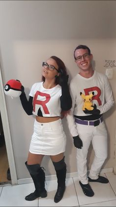 a man and woman dressed up in pokemon costumes