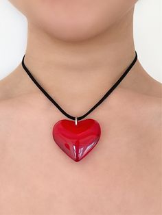 The necklace guaranteed to make your heart skip a beat - prepare to fall in love! Meet the limited edition 'FIRST DATE' suede wrap choker - featuring a large red heart pendant strung alongside faux black suede leather, this piece will easily make a statement with any look! ♥ Made with a large red glass heart pendant an Heart Pendant Choker, Chunky Red Heart Necklace, Large Heart Pendant Necklace, Large Heart Necklace, Red Heart Necklace Aesthetic, Red Glass Heart Necklace, Red Heart Jewelry, Red Heart Pendant Necklace, Ribbon Necklaces