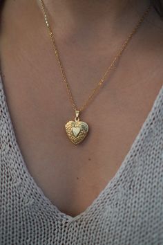 18-karat gold plated dainty heart locket hangs on a sturdy 18-karat gold plated stainless steel chain. Choose your chain length from the drop-down menu.  Chain length (model wears): 18 inches  You can choose the locket as is, without photos, or have it personalized with your photo (s). The picture you choose will be printed on professional photo paper.  ENGRAVING SERVICE  You can choose the locket as is, or have it personalized by engraving your birth flower, initial or a short message at the ba Wedding Heart Pendant Gold Plated Locket Necklace, Gold Plated Locket Necklace For Wedding, Gold-plated Heart Pendant Locket Necklace, Gold Plated Heart Pendant Locket Necklace, Dainty Heart Pendant Locket Jewelry, Gold Plated Pendant Locket Necklace For Weddings, Gold Plated Heart Locket Pendant Necklace, Gold Plated Heart Locket Necklace, Gold Plated Heart Pendant Locket Jewelry