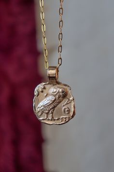 PRE-ORDER PENDANT: once ordered, processing times are 20-30 days. This pendant represents the owl, the sacred symbol of Athena, caught from a dark drachma dating back to 340 BC. C. The pendant was hand sculpted in wax and then cast in gilded bronze using the ancient lost wax technique. Bronze is nickel and lead free. Bronze is a living material which, over time, reacts with the pH of the skin and can darken and leave a light green patina on your skin. The patina on the skin is absolutely not har Lost Wax Jewelry, Athena Owl, Ancient Jewels, Silver Casting, Green Patina, Bronze Necklace, Sacred Symbols, Jewellery Ideas, Ancient Jewelry