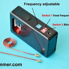 an electronic device with wires attached to it and instructions on how to use the battery