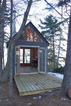 a small house built into the side of a tree