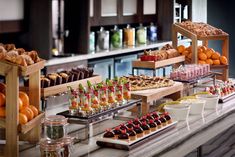 an assortment of desserts and pastries on display