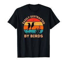 an image of birds flying in the sky at sunset t - shirt for birders