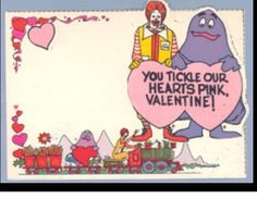 an old valentine's day card with two clowns holding a heart shaped sign