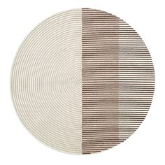 a round rug with two different colors on it