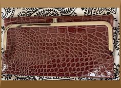 "Brown Wallet Glossy Crocodile Texture. metal clutches and and unbutton center compartment Wallet opens Flat. Measures 9\"x 5.5\"x 1\" you have one drivers license size secure slot where you can put id photo or driver license on the righ on the left there 3 credit card size slots for your credit cards . Also has a big zipper compartment for your other thing It has double frame right! outer frame is a kiss lock clutch. Two compartments in inner frame with clutch have a zipper pocket in each and e Rectangular Business Wallet With Crocodile Pattern, Brown Business Wallets With Crocodile Pattern, Designer Crocodile Pattern Rectangular Wallet, Luxury Rectangular Wallet With Crocodile Pattern, Crocodile Texture, Driver License, Texture Metal, Boot Bracelet, Id Photo