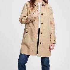 Straight Cut Trench Coat In Tan Khaki Shade. Long Midi Length With Buttons Down Front. Notched Collar. Shell Is 67% Cotton. Excellent Like New Condition. Cotton Trench Coat, Long Midi, Gap Jacket, Gap Jackets, Khaki Color, Notched Collar, Straight Cut, Midi Length, Trench Coat