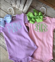 Precious bodysuit personalized with a large monogram.   This bodysuit is so soft!  This is a boutique type fabric *Available in 3 colors: White, light pink or a soft lavender *Thread color and Font are your choice *Snap opening down the back and the crotch. Please list the monogram EXACTLY how you want it.  first, LAST, middle example: Katie Marie Smith would be kSm Monogram will be sewn EXACTLY as you send it.  If you are in doubt please send me a message. Bows are not available My shipping tim Cute Fitted Bodysuit For Loungewear, Fitted Onesie With Name Print For Summer, Fitted Summer Onesie With Name Print, Cute Solid Color Spring Onesie, Fitted Pink Onesie For Loungewear, Fitted Short Sleeve Bodysuit With Letter Print For Summer, Summer Fitted Short Sleeve Bodysuit With Letter Print, Cute Fitted Onesie For Loungewear, Cute Bodysuit For Spring