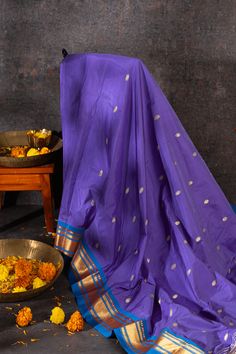 Wrap yourself in luxury with our Handwoven Narali Kath Lavender pure silk yeola paithani. Experience the softness and elegance of pure silk, handwoven by skilled artisans. Perfect for any occasion, this one-of-a-kind piece will make you stand out in style! Purple Paithani Silk Handloom Traditional Wear, Purple Paithani Silk Traditional Wear With Pallu, Purple Paithani Silk Traditional Wear, Purple Paithani Silk Traditional Wear For Ceremonies, Purple Cotton Silk Saree For Puja, Purple Cotton Silk Traditional Wear With Zari Weaving, Purple Zari Weaving Traditional Wear In Cotton Silk, Purple Paithani Silk Traditional Drape Wear, Purple Silk Traditional Wear For Puja