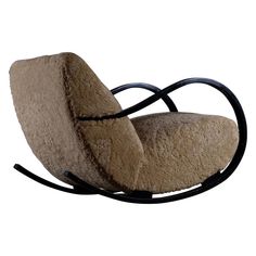 a chair that has some kind of cushion on it's backrest and is made out of sheepskin