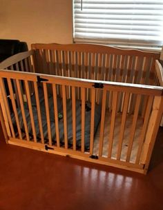 a baby crib in the corner of a room