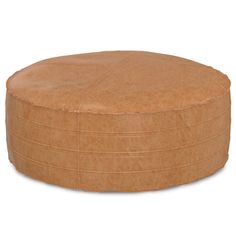 a large round leather ottoman on white background