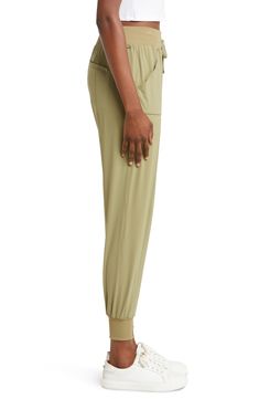 A ribbed elastic waistband and an adjustable drawstring bring easy-wear comfort to lightweight, stretchy joggers finished with convenient pockets. 28 1/2" inseam; 4 1/2" leg opening; 12" front rise; 16" back rise 77% nylon, 23% spandex with 95% nylon, 5% spandex and 87% polyester, 13% spandex contrast Machine wash, line dry Imported Sporty Stretch Joggers With Cuffed Ankles, Athleisure Stretch Joggers With Cuffed Ankles, Relaxed Fit Joggers With Elastic Waistband And Cuffed Ankles, Spring Joggers With Elastic Waistband And Cuffed Ankles, Stretch Pull-on Joggers For Jogging, Athleisure Joggers With Elastic Waistband And Cuffed Ankles, Stretch Joggers With Pull-on Style For Jogging, Spring Stretch Joggers With Elastic Cuffs, Spring Joggers With Stretch And Elastic Cuffs