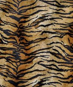 an animal print that is brown and black