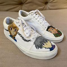 The scoop: *Custom hand-painted Old Skool Vans *Features Hunter x Hunter anime theme *Mens size 10 *Japanese manga series. Animation action adventure Gon Freecss aspires to become a hunter, an exceptional being capable of greatness. With his friends and his potential, he seeks out his father, who left him when he was younger. *faces on toe box, Hunter x Hunter on back of R heel, face/chain link on outside R shoe, spider on outer L shoe. *excellent condition, worn only once! *one-of-a-kind pair of custom Vans *attention grabbers! Enjoy! Casual Low-top Custom Sneakers With Anime Print, Casual Custom Sneakers With Anime Print, Casual Custom Sneakers With Character Print For Streetwear, Harajuku Anime Print Sneakers With Round Toe, White Casual Custom Sneakers With Anime Print, Casual White Custom Sneakers With Anime Print, White Casual Sneakers With Anime Print, Harajuku Style Anime Print Round Toe Sneakers, Casual Custom Sneakers With Character Print