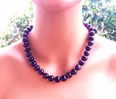 Amethyst Necklace. Beaded necklace. February birthstone. Natural purple stone.  Gift for her.  Handmade, genuine, purple Orchid Amethyst gemstone necklace is a beautiful addition to your style.  Built around a single color theme, this necklace is easy to wear. The necklace measures 18 inches plus 2" extender.  I can make a necklace longer or shorter. If you want a necklace to longer than 20", contact for a price.Matching earrings and bracelets can be created for you.Genuine, untreated, dark purp Purple Polished Beads Necklace For Gift, Purple Polished Beads Necklace As Gift, Purple Polished Beads Crystal Necklace As Gift, Amethyst Gemstone Beaded Necklace Gift, Purple Beaded Necklaces With 8mm Beads For Gifts, Purple Beaded Necklaces With 8mm Beads As Gift, Purple Beaded Necklace With 8mm Beads As Gift, Gift Amethyst Necklaces With Round Beads, Amethyst Beaded Necklaces With Round Beads For Gifts