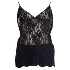 100% authentic Saint Laurent camisole top in sheer black lace (silk 100%). Has adjustable spaghetti straps. Has been worn and is in excellent condition. Measurements Tag Size Missing Tag (M/L) Size M Bust To 90cm (35.1in) Waist To 90cm (35.1in) Hips To 100cm (39in) Length 60cm (23.4in) Side Seam Length 37cm (14.4in) All our listings include only the listed item unless otherwise specified in the description above. Lace Silk, Silk Lace, Lace Camisole, Tank Top Camisole, Black Silk, Halter Top, Tank Top Shirt, Black Lace, Dream Closet