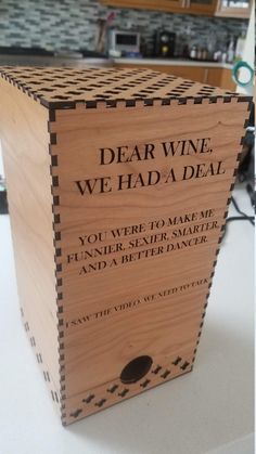 a wooden box that says dear wine, we had a deal