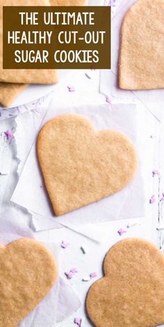 the ultimate healthy cut - out sugar cookies with text overlay that reads, the ultimate healthy cut - out sugar cookies