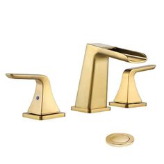 a gold faucet and soap dispenser on a white background