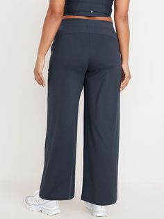 elasticized waist hip pockets seamed front leg pockets fit your phone go-dry wicks moisture pull-on style sits at belly button loose hip and thigh wide leg 30 1/2" regular inseam 28 1/2" petite inseam 33 1/2" tall inseam models are approx.  5'9" and wear sizes s (4), l (12), and xl (18)machine wash according to the care instruction label Full Length 4-way Stretch Pants For Loungewear, Sporty Relaxed Fit Pull-on Bottoms, Wide-leg Yoga Pants With Pockets For Loungewear, Wide Leg Activewear With Pockets And 4-way Stretch, Comfortable Full-length Pull-on Sweatpants, Mid-rise Relaxed Fit Pull-on Pants, Wide-leg Bottoms With Wide Waistband, Relaxed Fit Wide Leg Pants With Pull-on Style, Full Length 4-way Stretch Pull-on Pants