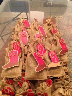 burlap bags filled with pink and red items