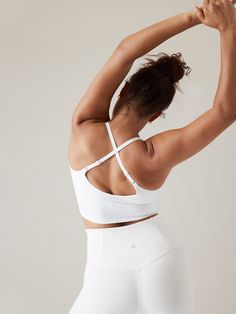 BEST FOR STUDIO: yoga + barre + pilates FEEL: Powervita™ fabric is buttery soft with support that feels like a gentle hug FAVE: Adjustable straps for a custom fit IMPACT: Light-impact workout, best for D-DD cups Removable pads. Now available in plus sizes 1X to 3X.