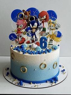 a birthday cake with sonic the hedgehog characters on it